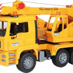 Camion grue MAN, jaune