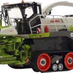 CLAAS Jaguar 990TT Ensileuse sur cheniiles avec bec à maïs CLAAS Orbis