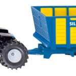 NEW HOLLAND T9 avec remorque