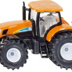 Tracteur NEW HOLLAND avec chasse neige et lame de dénaigement