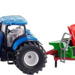 NEW HOLLAND avec chargeur et distributeur STRAUTMANN