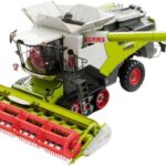 CLAAS Lexion 6900 TT Moissonneuse batteuse avec coupe blé Vario 930 et chariot de transport