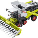 CLAAS Lexion 8900 TT avec bec à maïs Corio 1275 C Conspeed et chariot de transport