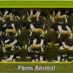 Assortiment de 12 vaches noires et blanches